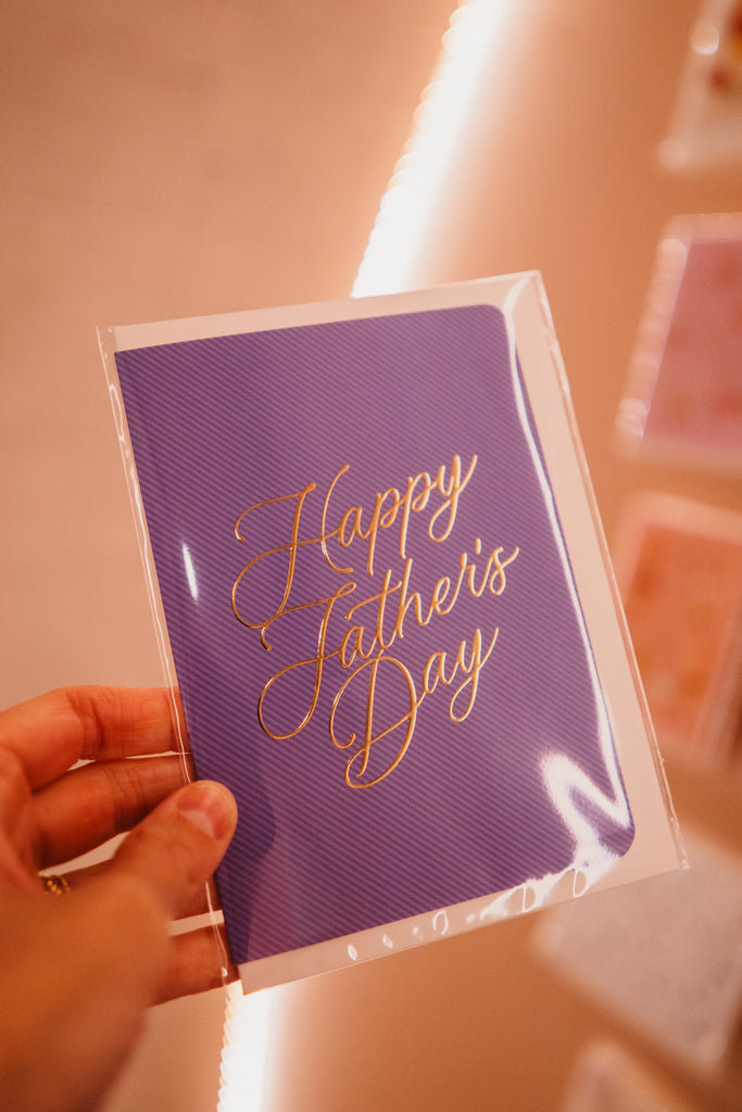 A simple and classy card that says 'Happy Father's Day' on the front in luxurious raised gold foil. Blank on the inside.